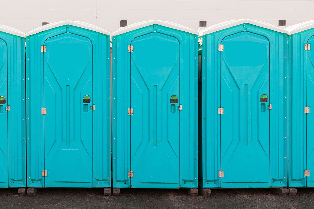 Industrial portable restroom units at a plant in Santa Rosa, California